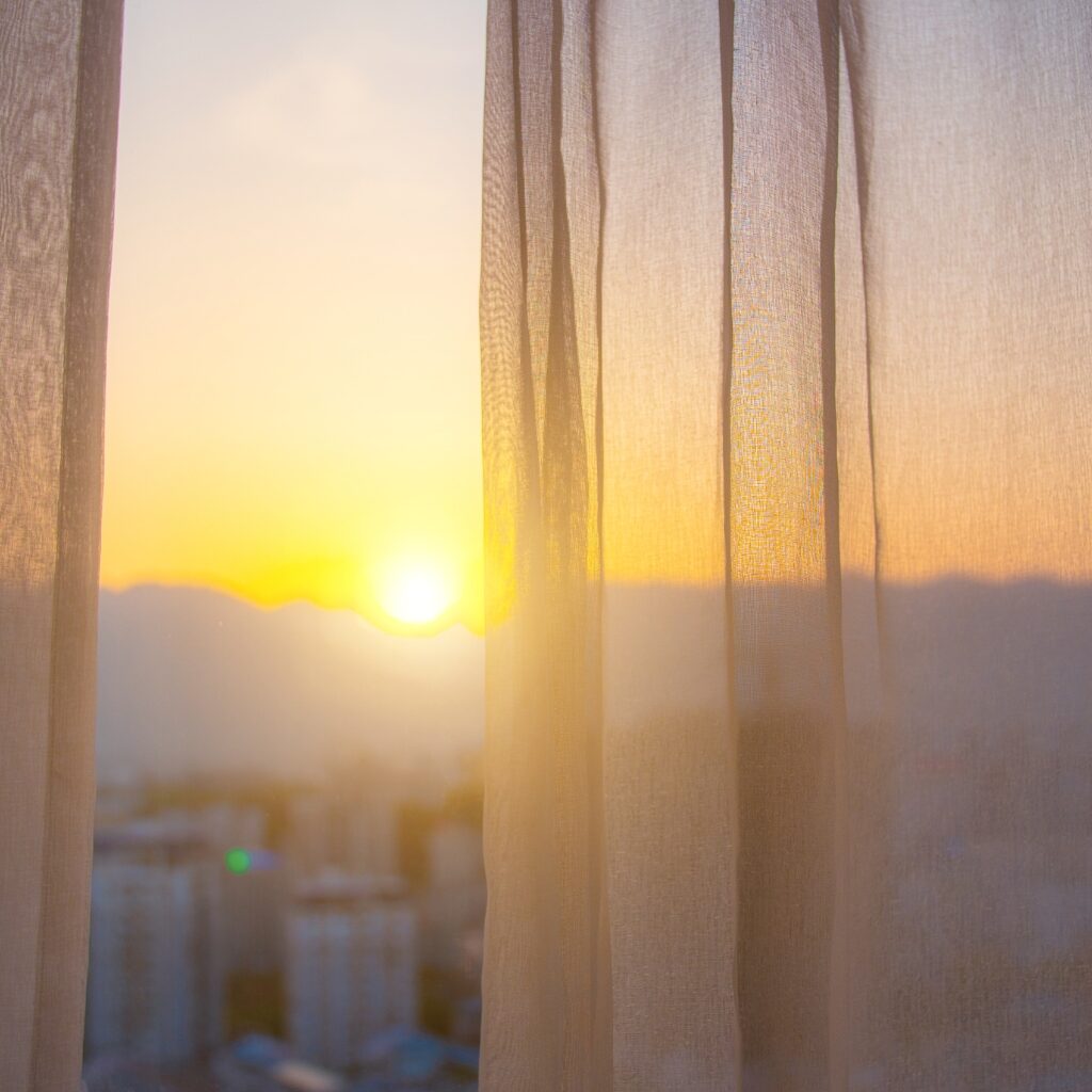 Opening Curtains to Utilize Natural Light.